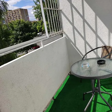 With A Balcony In The Very Center Of