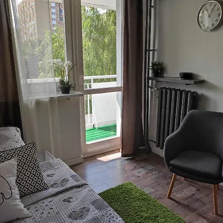 With A Balcony In The Very Center Of *